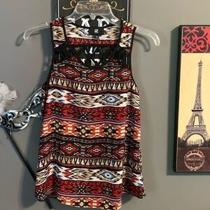 IZ Byer sleeveless blouse with cross cross panel on back. size XS